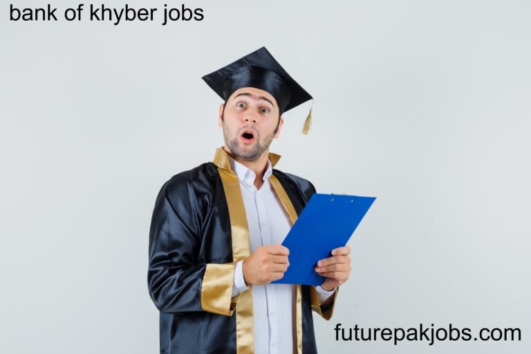 young man holding clipboard graduate uniform looking surprised front view 1