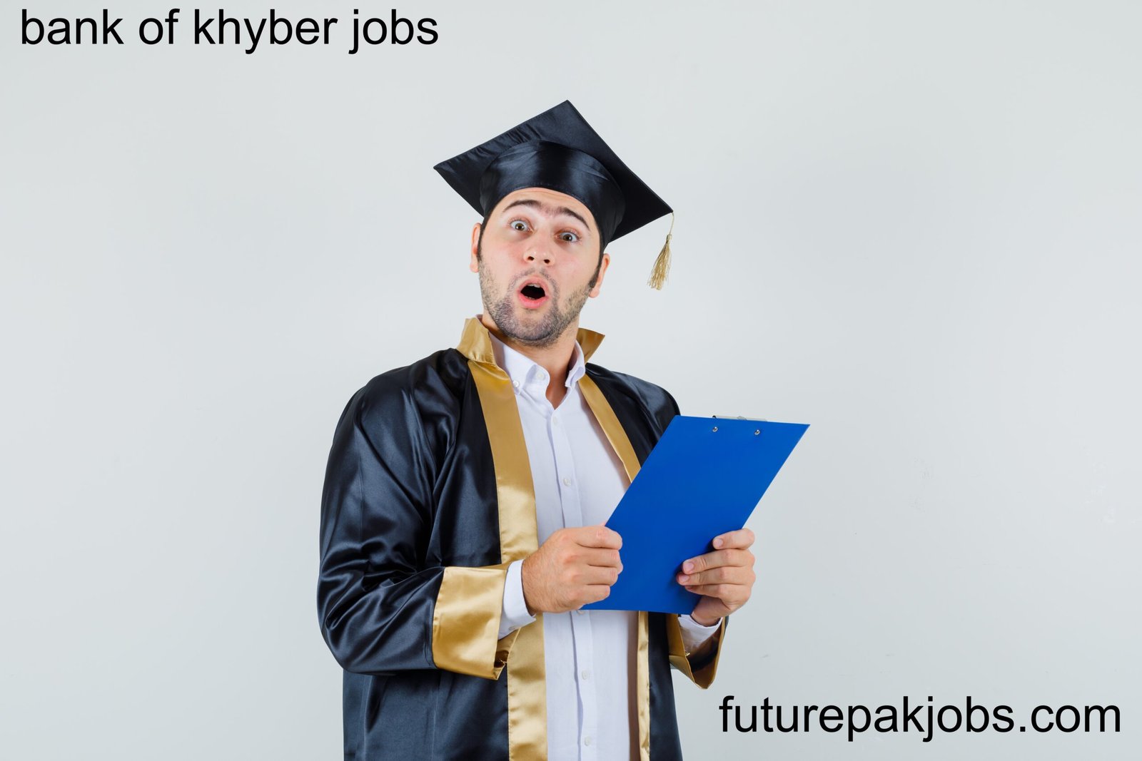 young man holding clipboard graduate uniform looking surprised front view 1 scaled